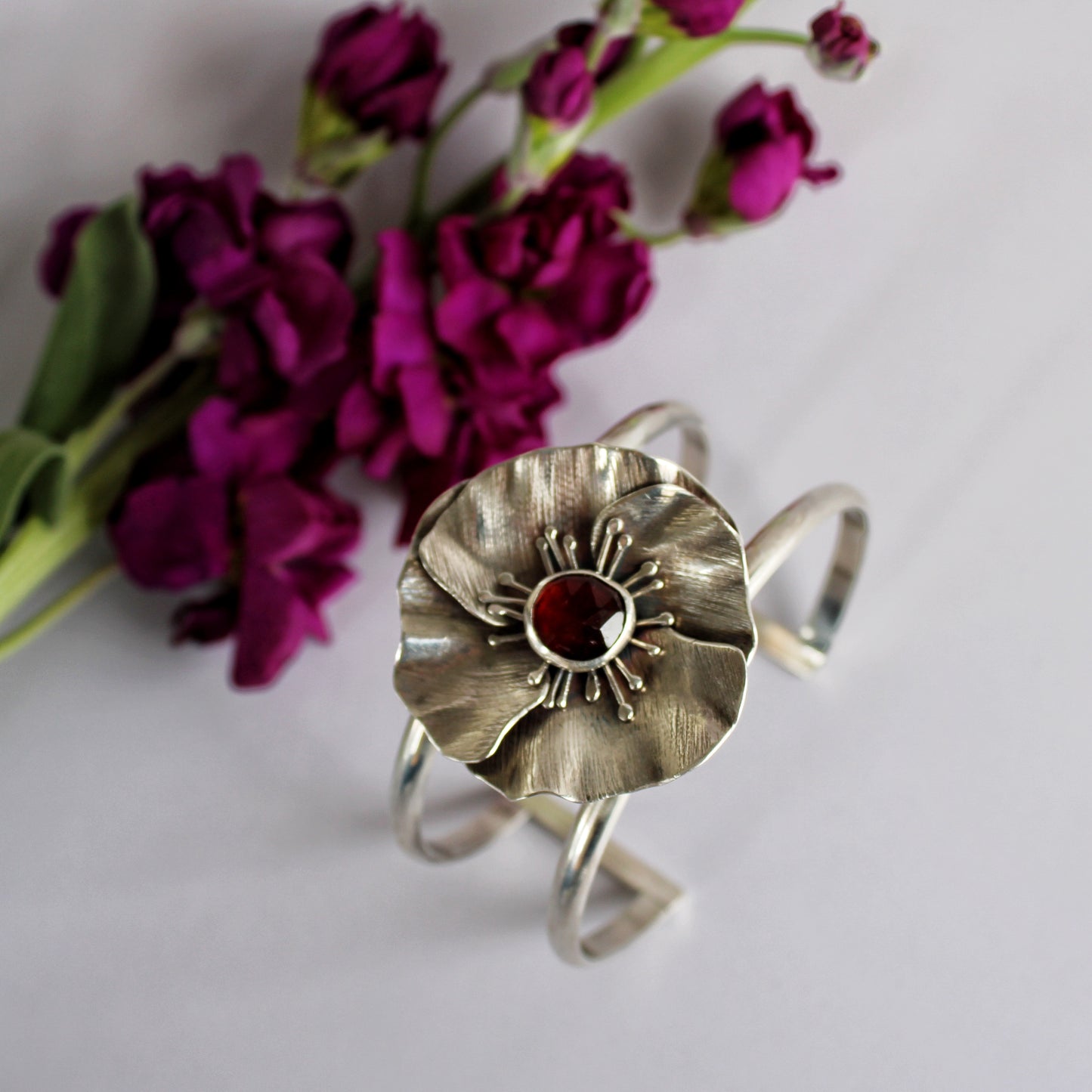 Wild Bloom Cuff: Sterling Silver and Hessonite Garnet Poppy