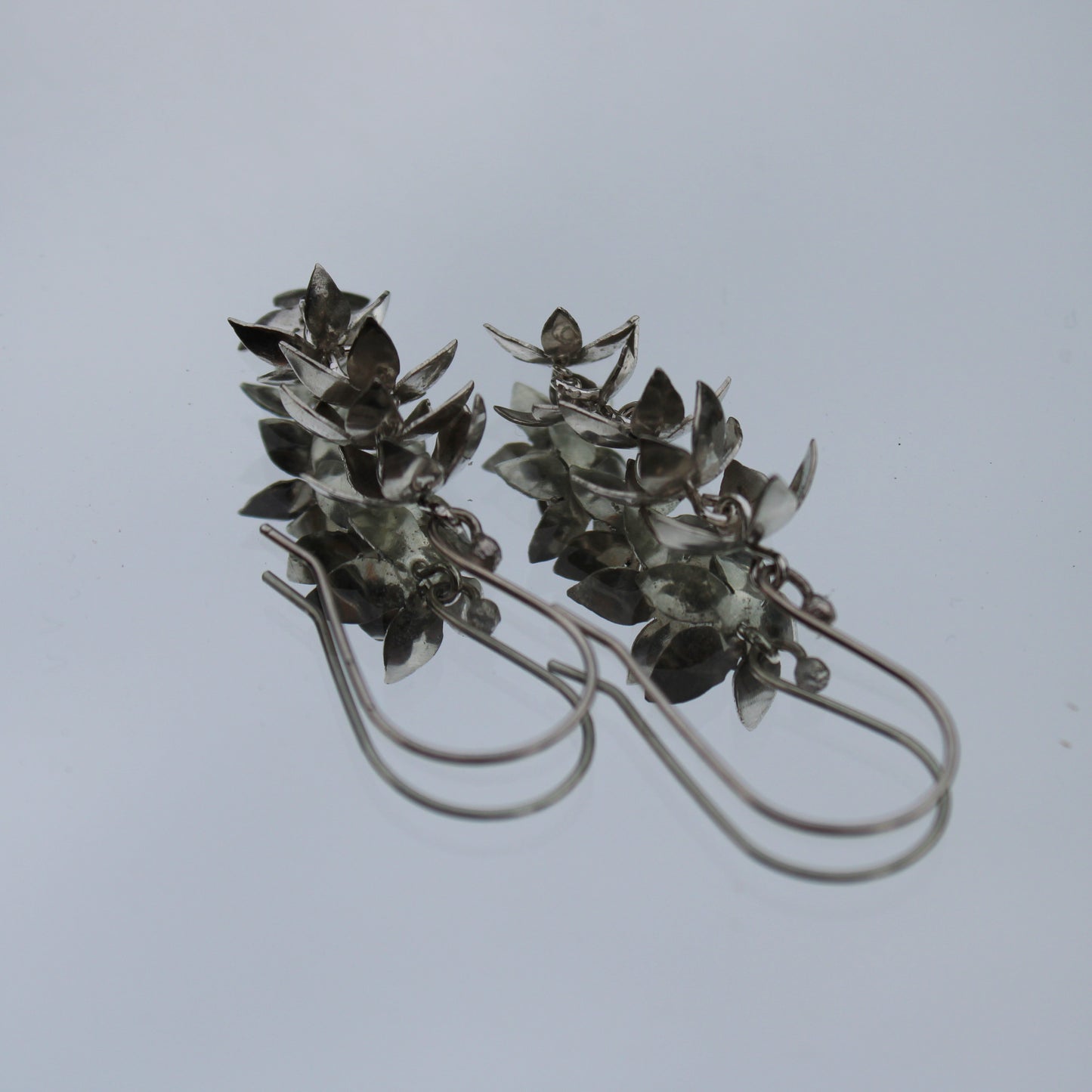 Bloom Cascade Earrings: Sterling Silver Flowers