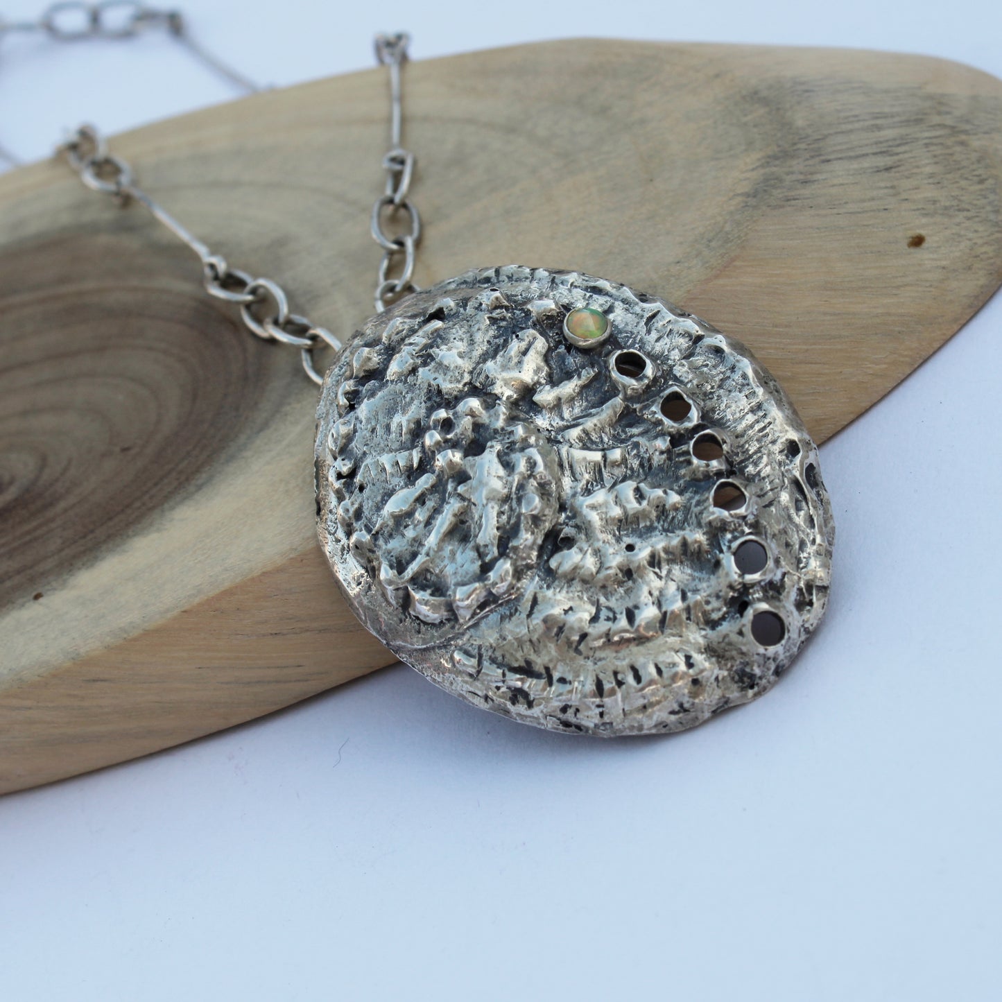 Breathing Tide Necklace: Hand-fabricated sterling silver abalone shell with Ethiopian Opal