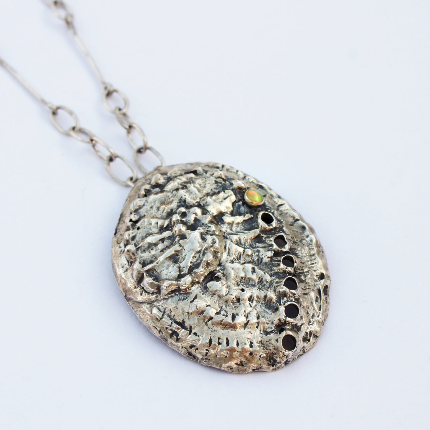 Breathing Tide Necklace: Hand-fabricated sterling silver abalone shell with Ethiopian Opal