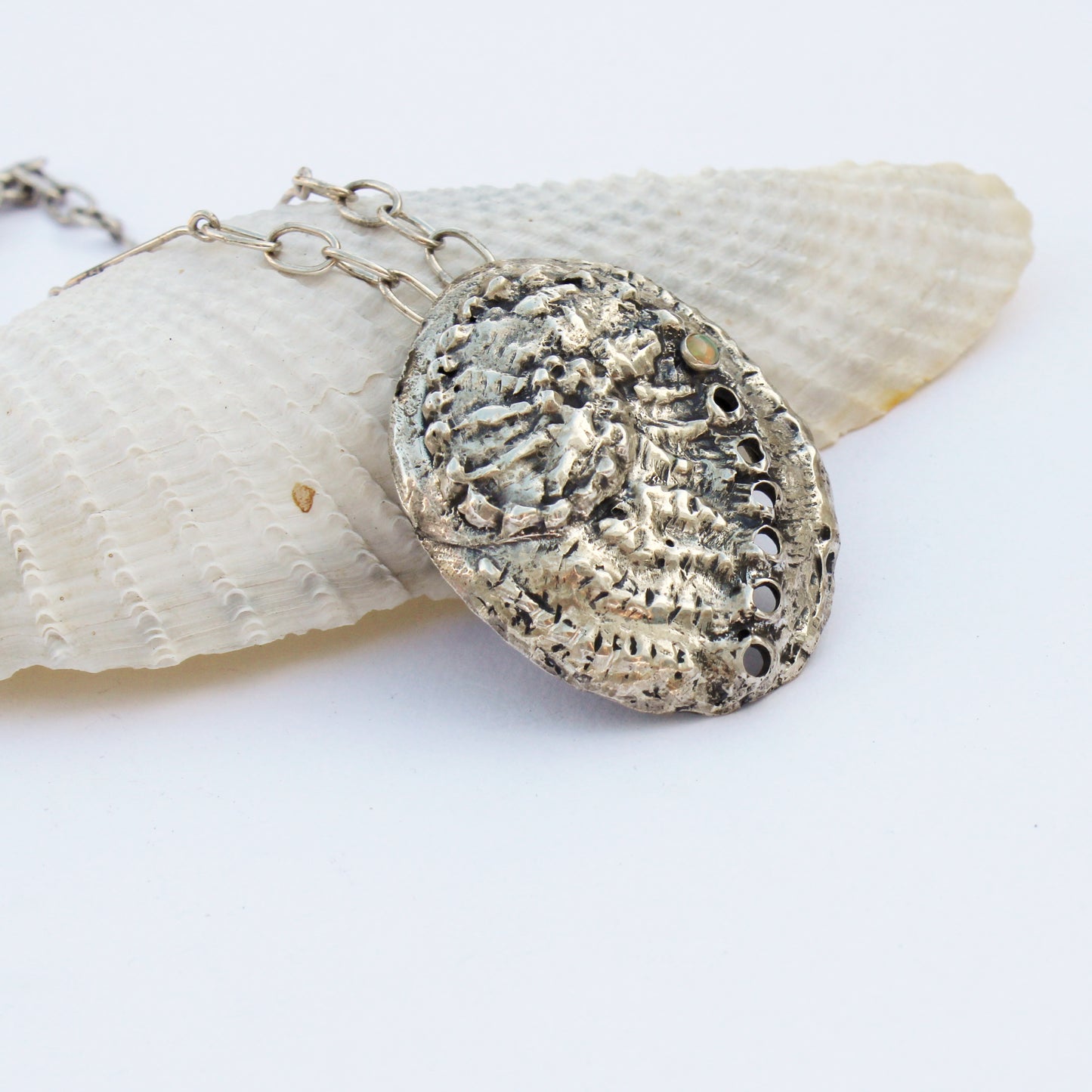 Breathing Tide Necklace: Hand-fabricated sterling silver abalone shell with Ethiopian Opal