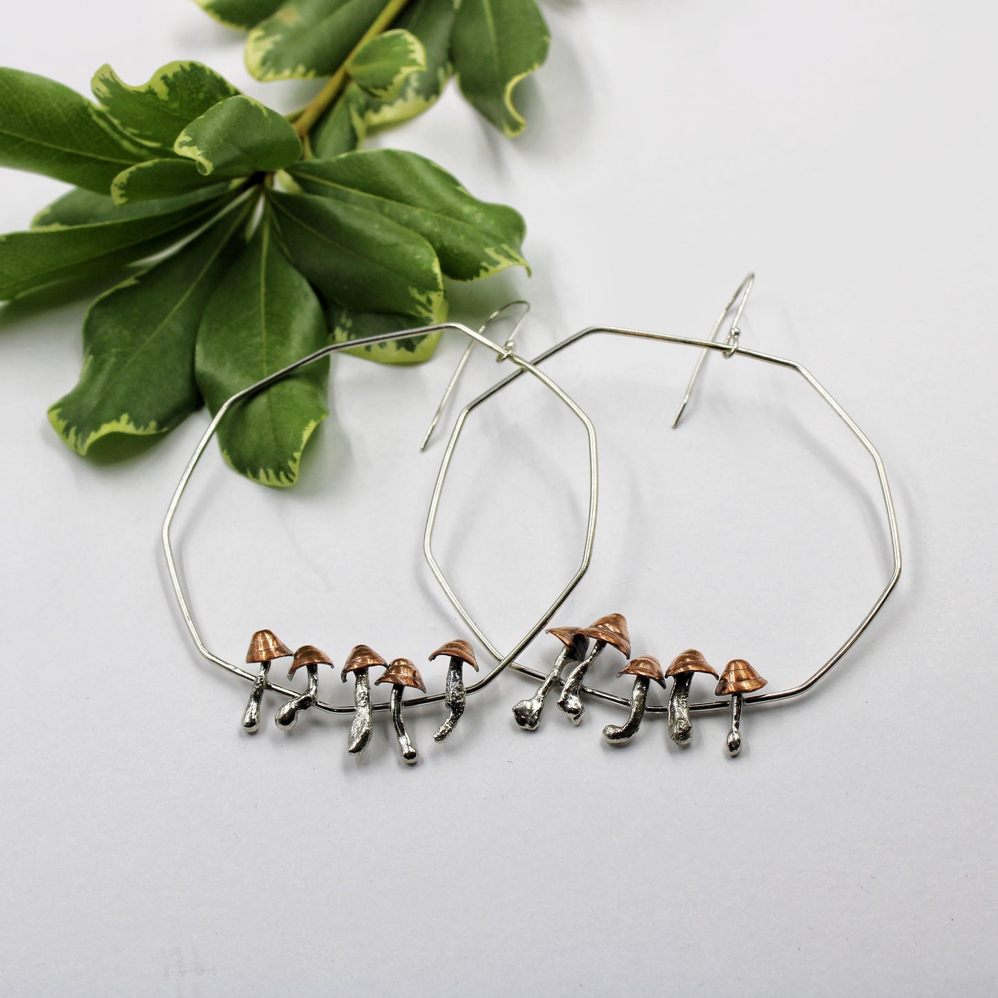 Enchanted Grove Earrings: Sterling Silver and Copper Mushroom Hoops