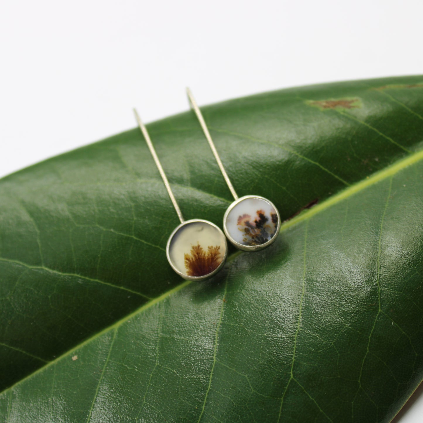 Earth's Embrace Earrings: Sterling Silver Dendritic Agate Wishbone