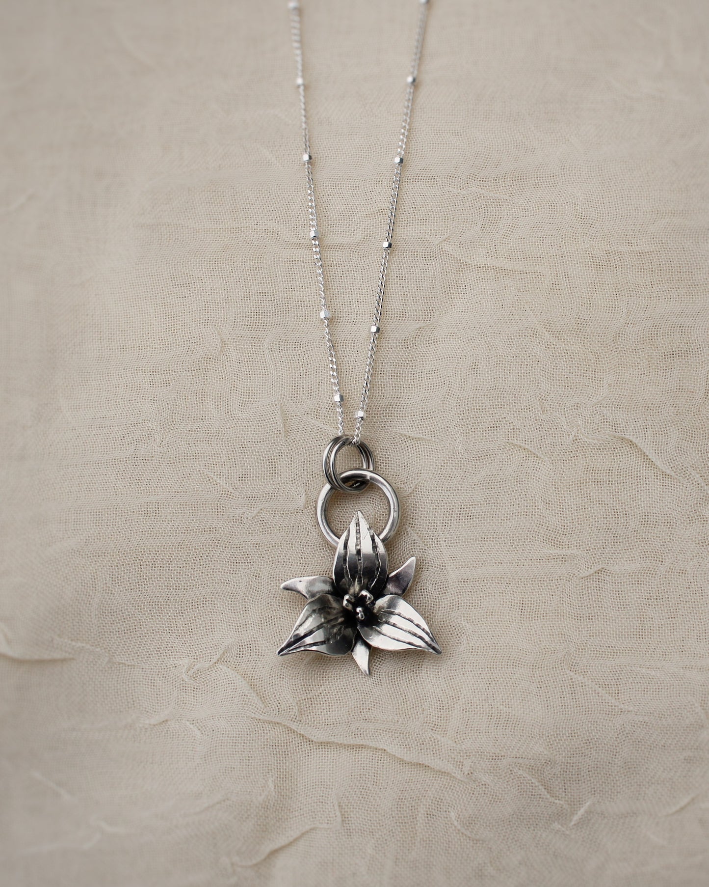 Trillium Tranquility Pendant: Sterling Silver Trillium