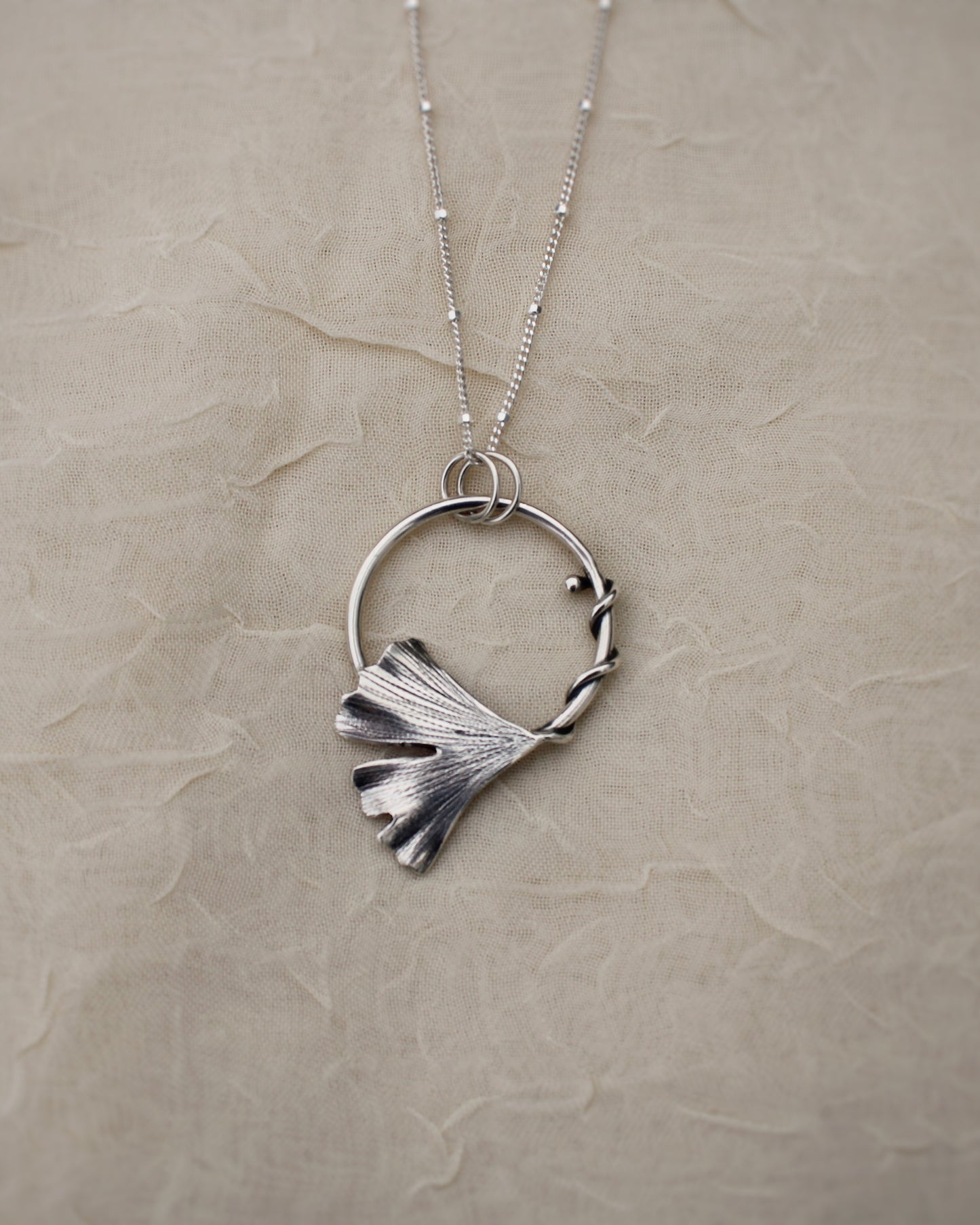 Golden Dawn Pendant: Sterling Silver Gingko Leaves