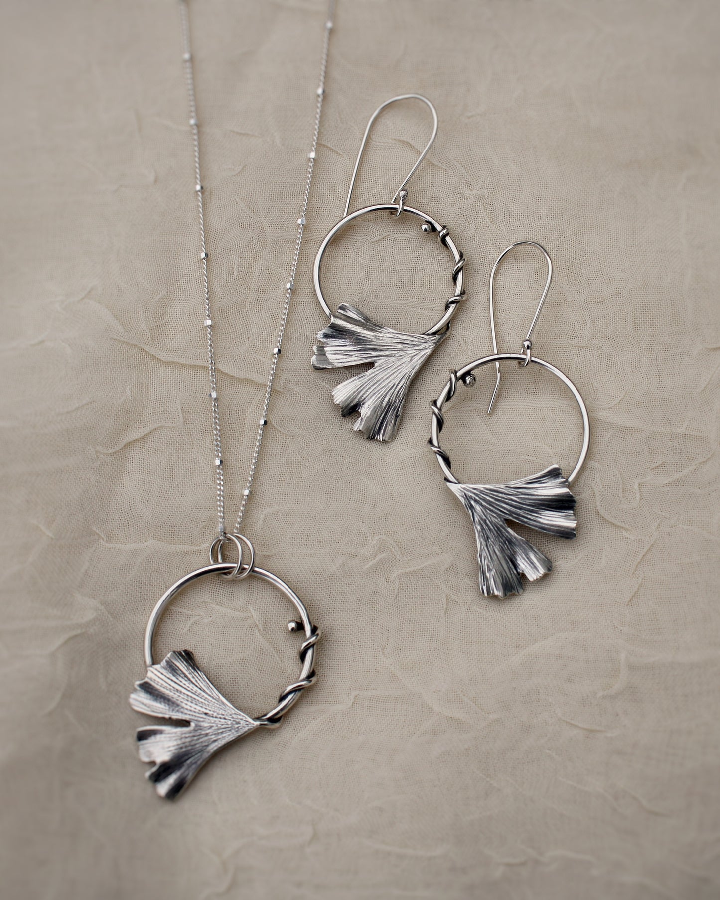 Golden Dawn Pendant: Sterling Silver Gingko Leaves