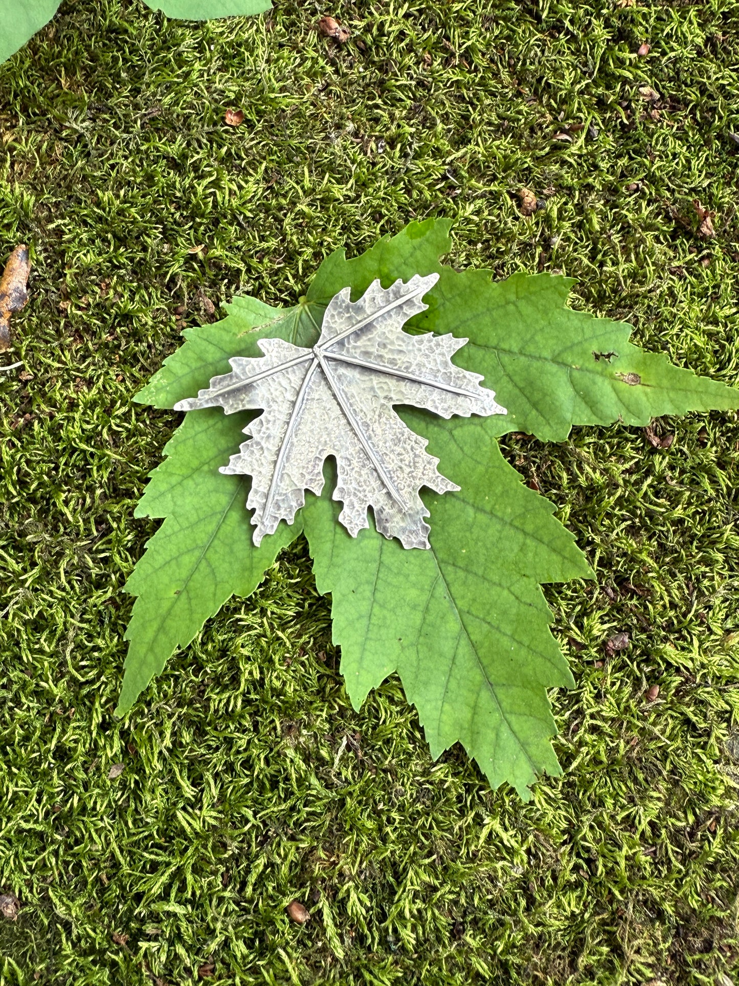 Turning Leaf Pendant: Sterling Silver Maple Leaf