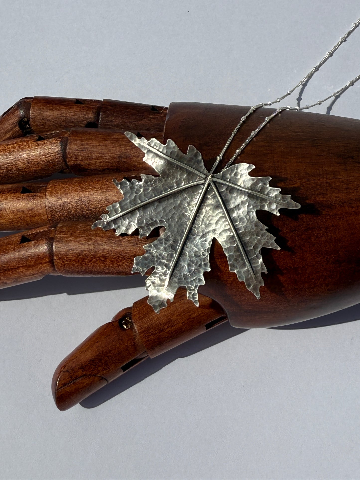 Turning Leaf Pendant: Sterling Silver Maple Leaf