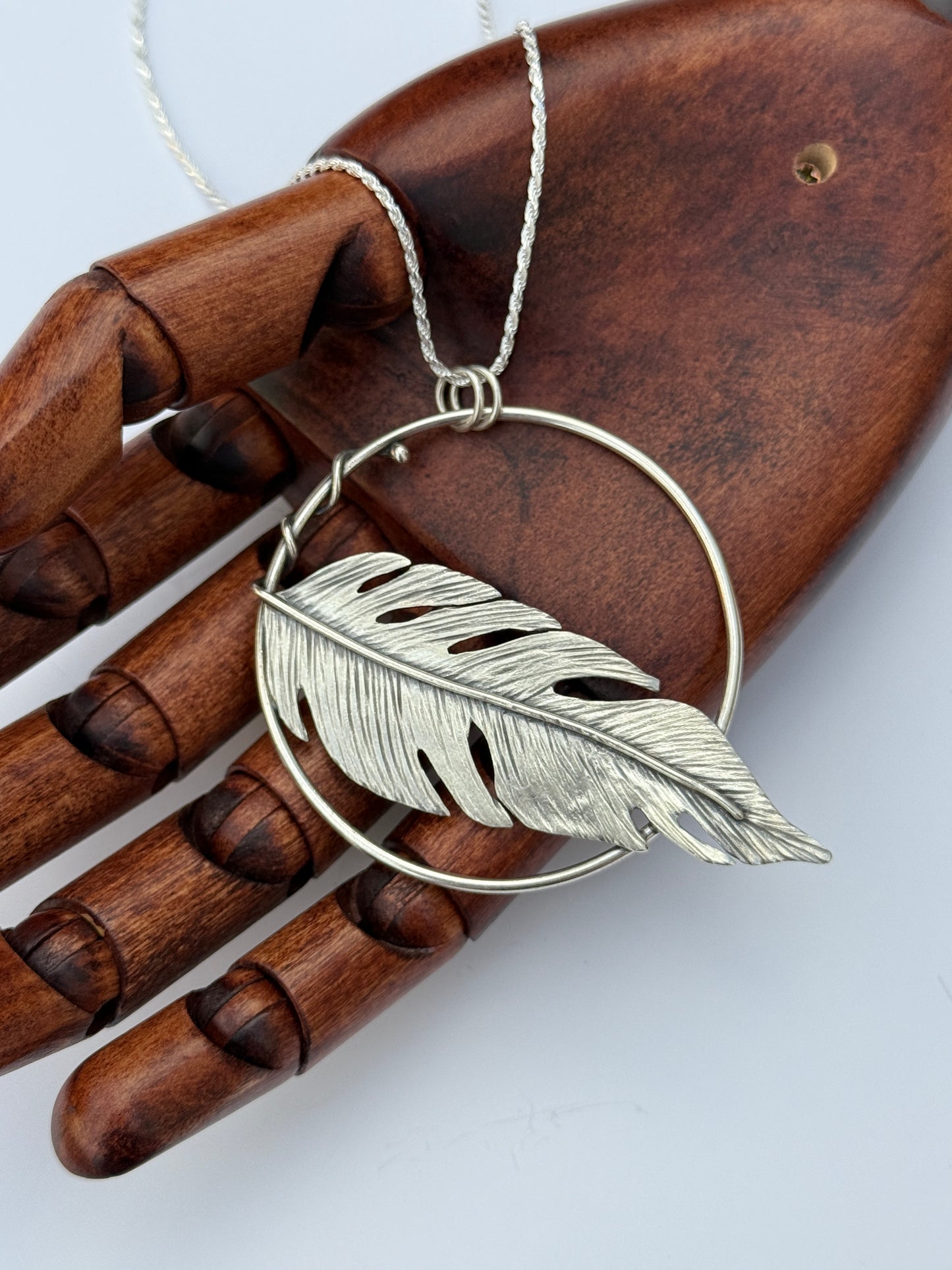 Soaring Spirit Pendant: Sterling Silver Feather Hoop