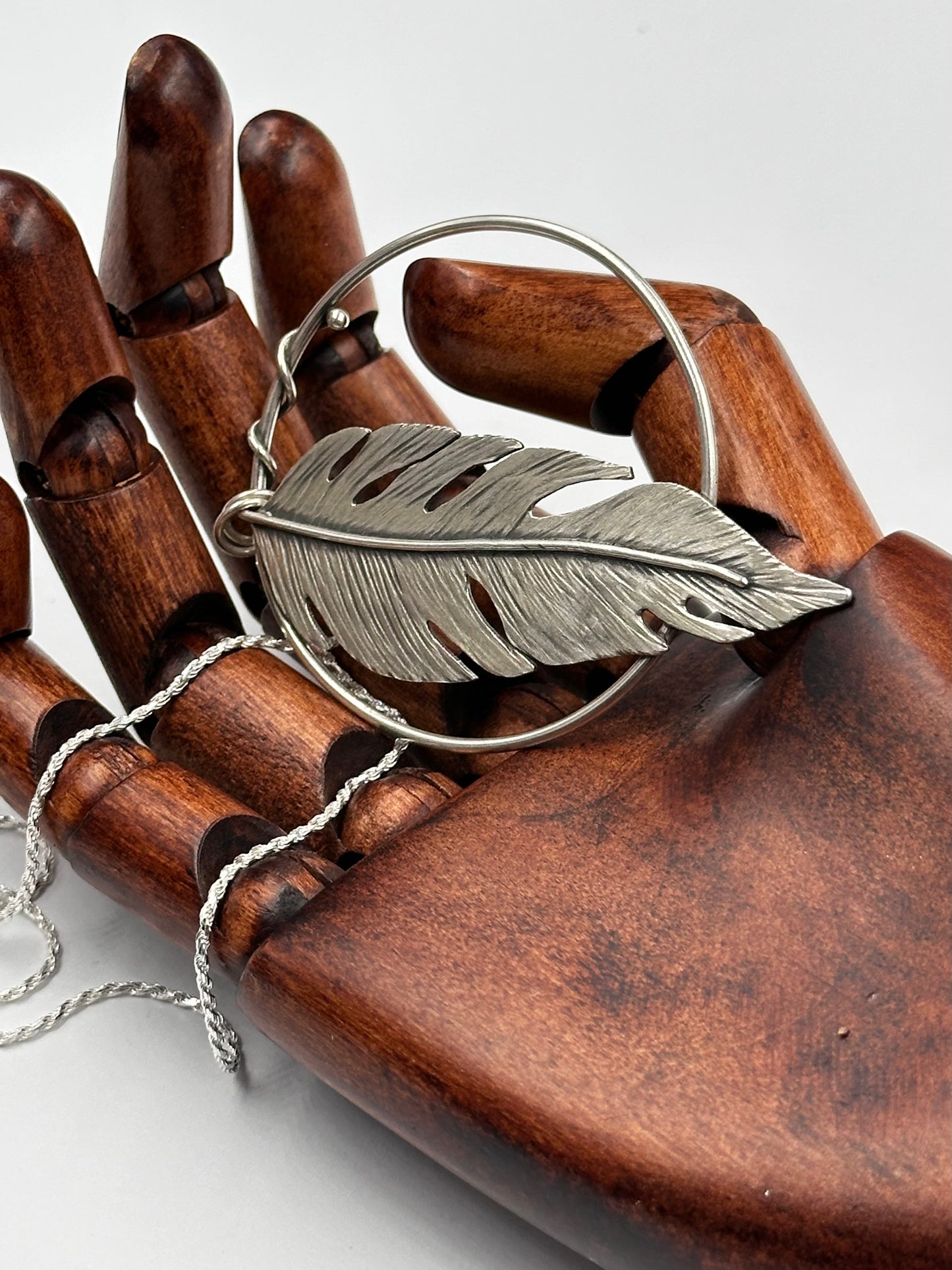 Soaring Spirit Pendant: Sterling Silver Feather Hoop
