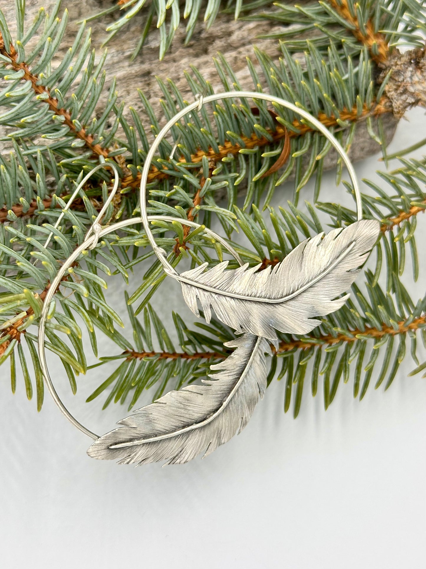The Freewind Feather Hoops: Sterling Silver