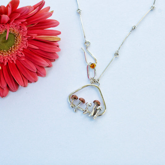 Forest Ember Necklace: Mushroom Pendant with Baltic Amber on Handmade Chain
