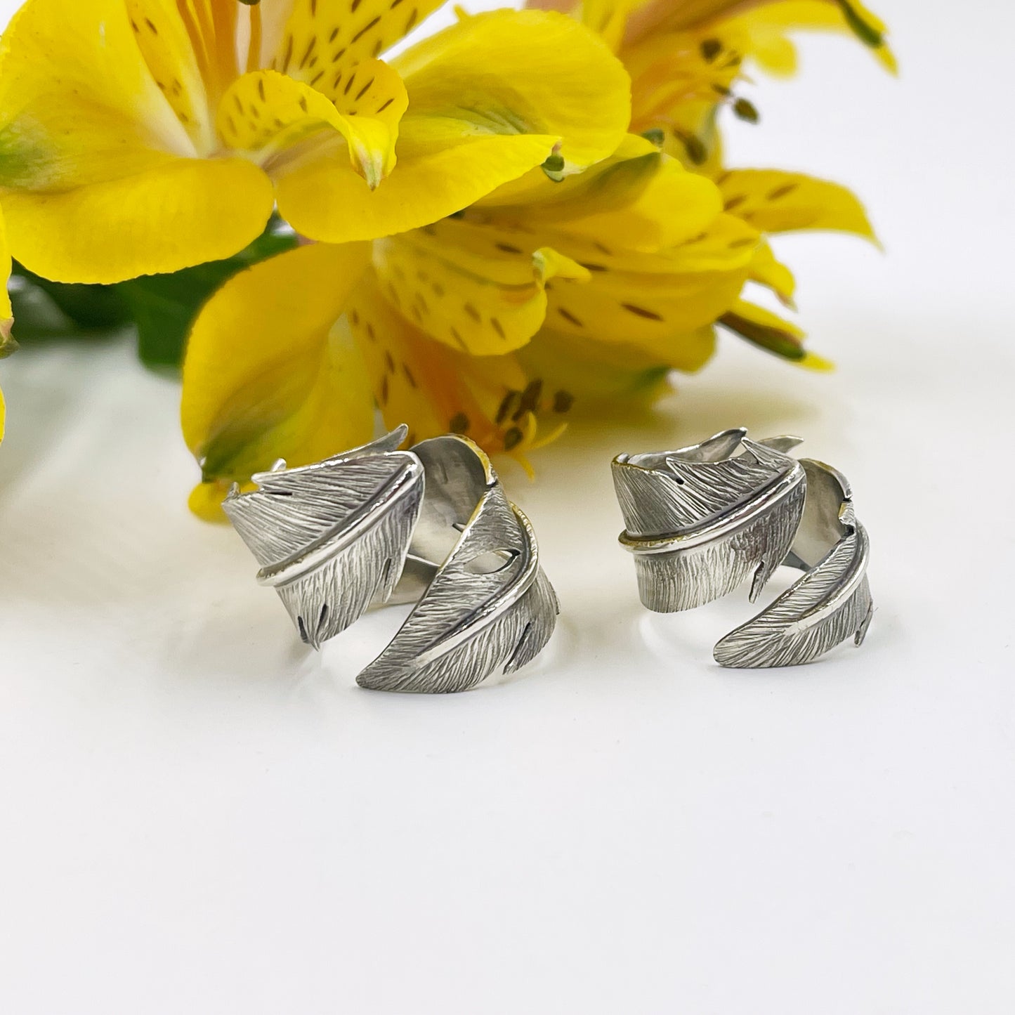 Feathered Tranquility Rings: Sterling Silver Feather Wrap