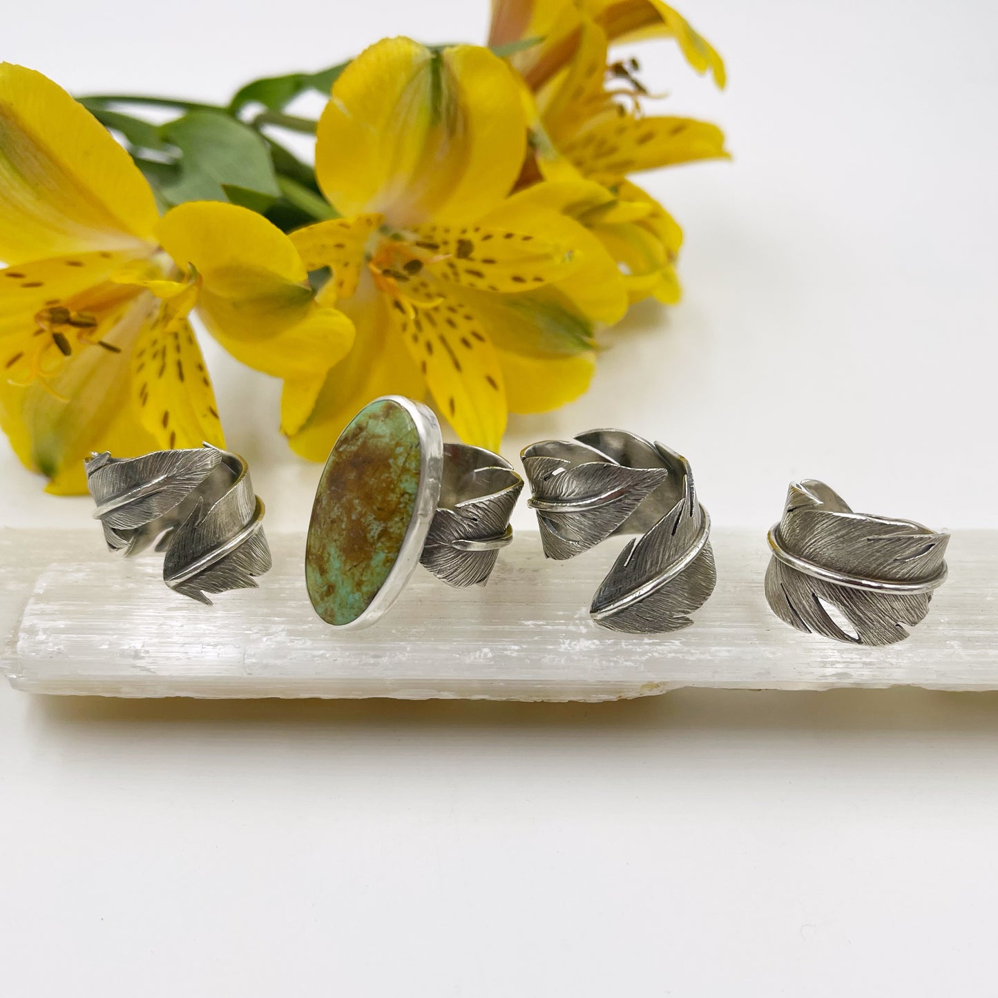 Feathered Tranquility Rings: Sterling Silver Feather Wrap