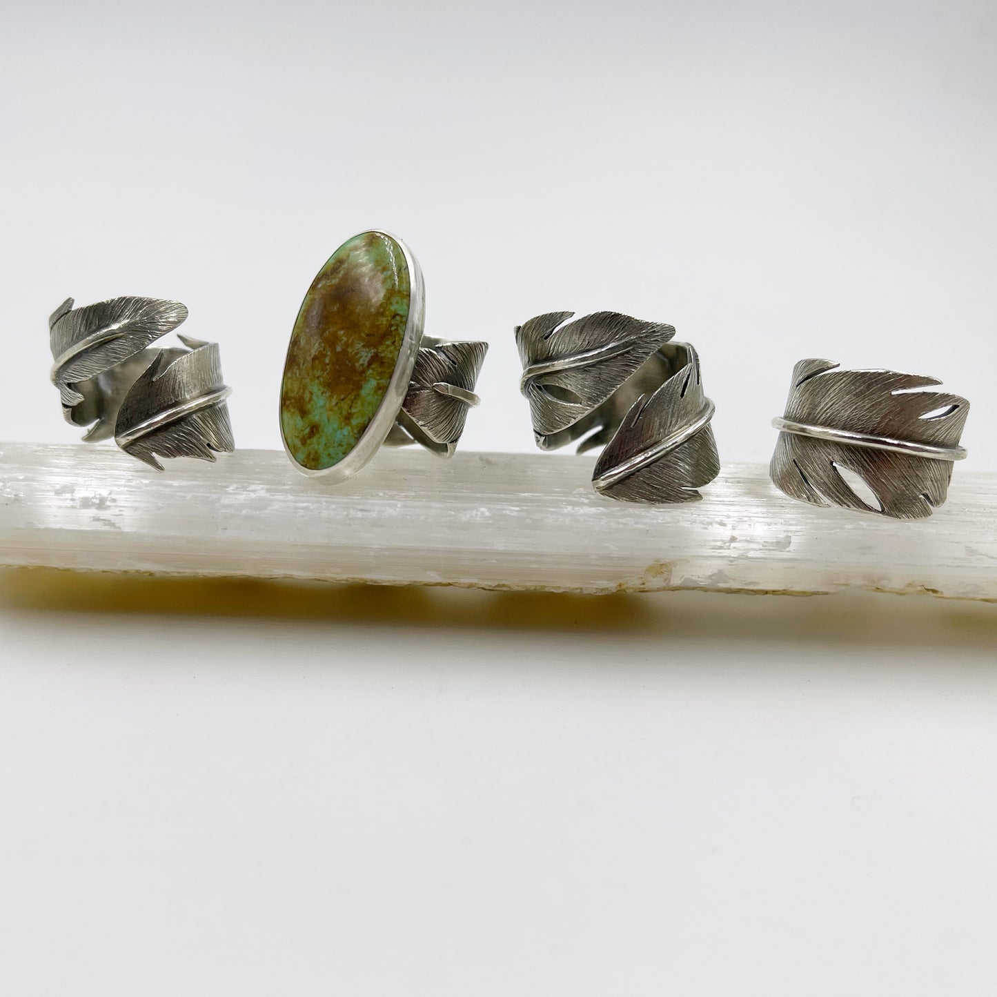 Feathered Tranquility Rings: Sterling Silver Feather Wrap