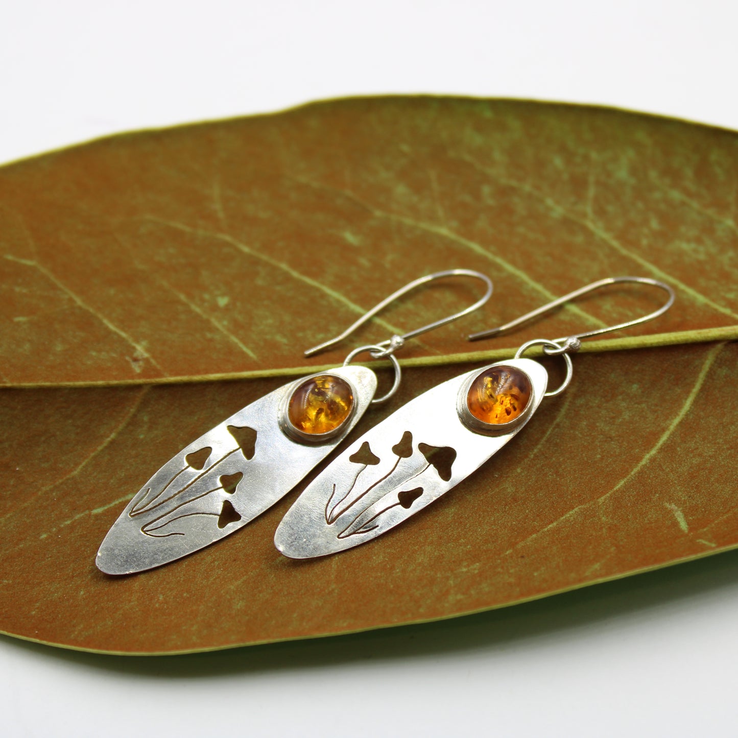 Mystic Mushroom Earrings: Sterling Silver & Baltic Amber